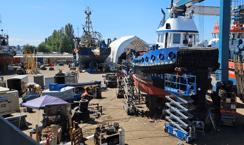 boat yard prepared for marine sandblasting and surface preparation
